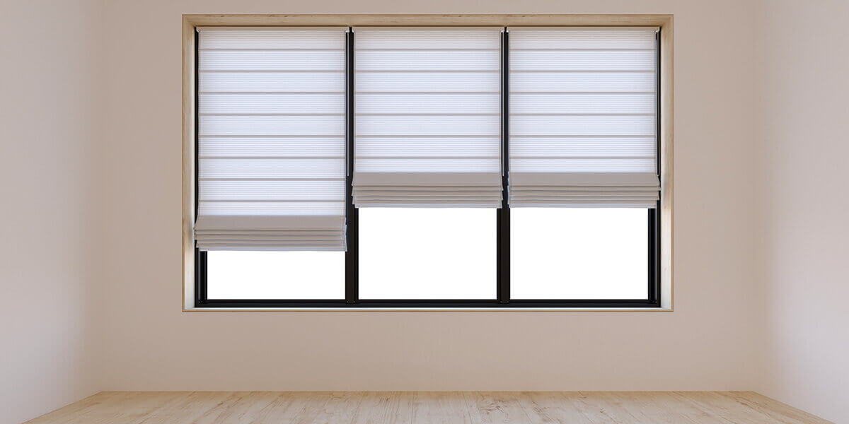 can you put roman shades over blinds